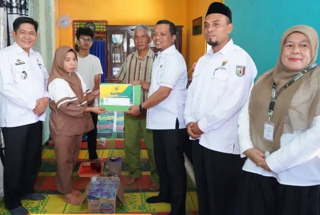Bupati Pringsewu Santuni Keluarga PMI Meninggal di Malaysia
