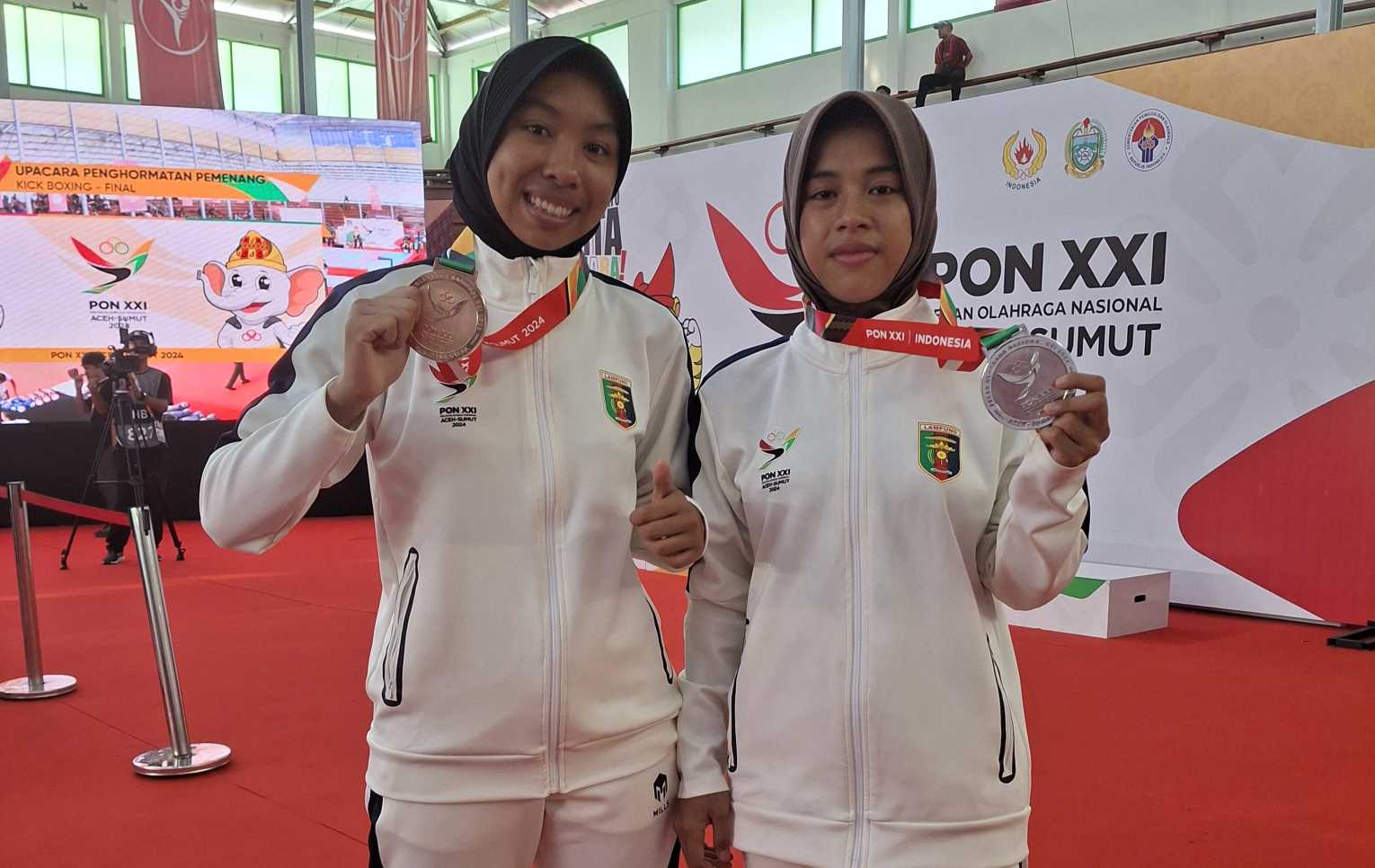 Dua Atlet Kick Boxing Asal Tanggamus Raih 2 Medali di PON XXI, Satu Perak dan Satu Perunggu 