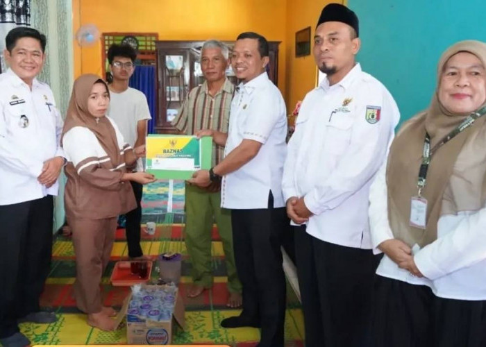 Bupati Pringsewu Santuni Keluarga PMI Meninggal di Malaysia
