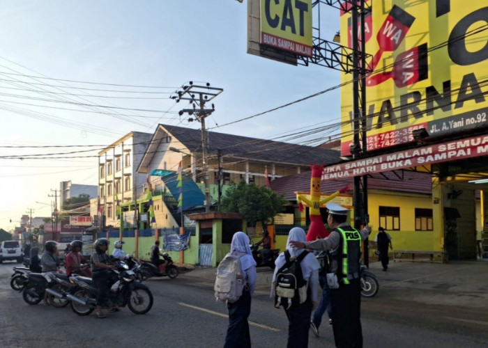 Satlantas Polres Pringsewu Intensifkan Pengaturan Lalu Lintas di Jam Rawan