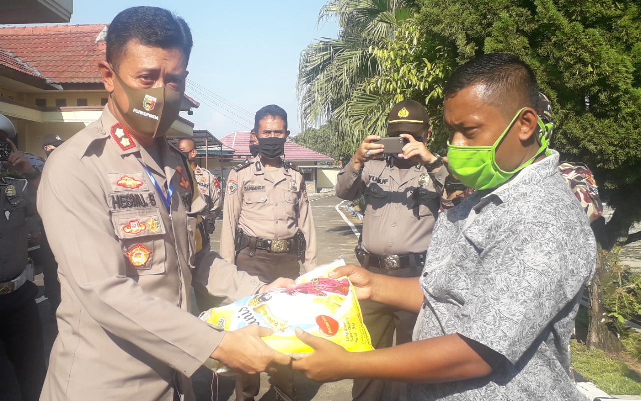 Polres Tanggamus Salurkan Bantuan 5 Ton Beras